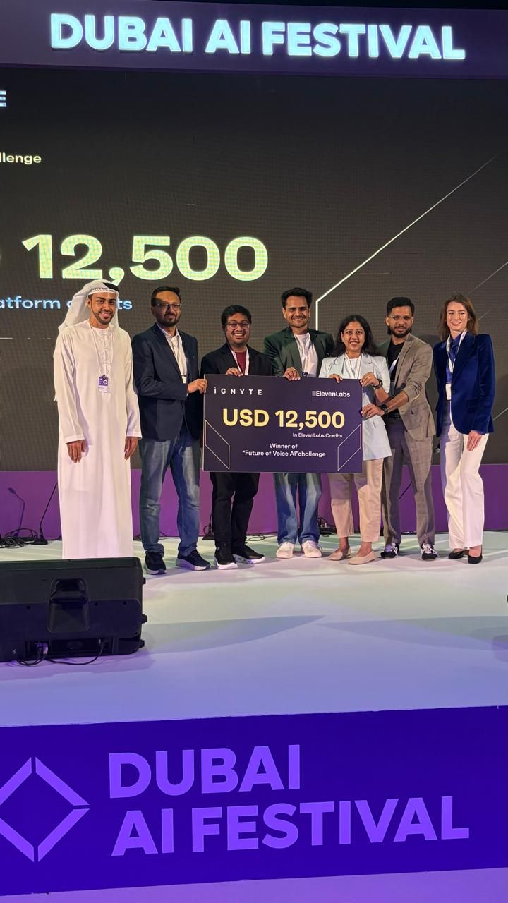 Team Mizan on the Dubai AI Festival stage with the winner's board